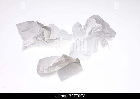 Crumpled and dirty tissue paper isolated on white background. Stock Photo