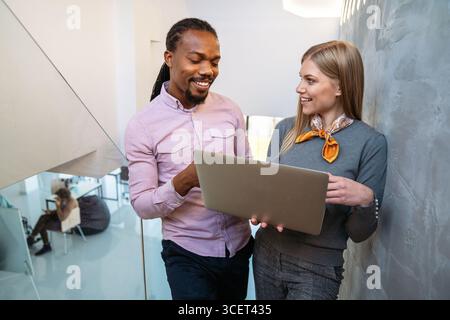 Artificial intelligence, programming innovation. Teamwork with laptops for future solutions Stock Photo