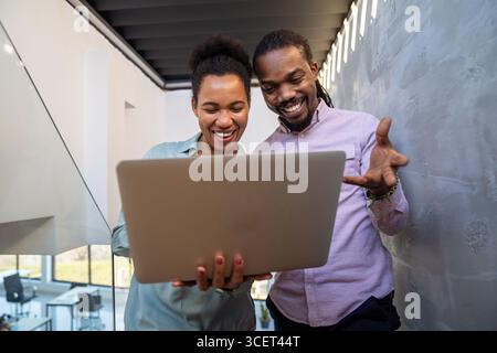 Programmers cooperating at IT company developing apps. People business work office concept Stock Photo