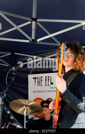 Bass player and drummer of a band playing at the Twickenham 60s festival, London, England Stock Photo