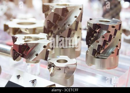 Various end cutters in the showroom. Metalworking, tools Stock Photo