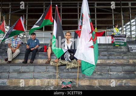 CARDIFF, WALES - JULY 16: A protest outside the Senedd where the names of 20,000 dead children were read out on July 16, 2025 in Cardiff, Wales. Stock Photo