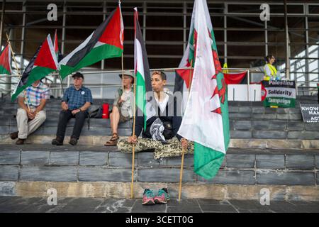 CARDIFF, WALES - JULY 16: A protest outside the Senedd where the names of 20,000 dead children were read out on July 16, 2025 in Cardiff, Wales. Stock Photo