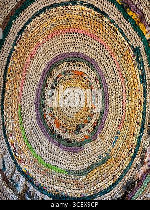 Colorful traditional hand-knitted rug with concentric patterns Stock Photo