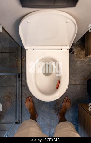 Modern restroom interior with stone gray tiles. interior of public ...
