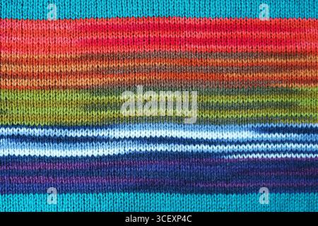 Beautiful Texture and Pattern of Turquoise Blue with Colorful Striped Alpaca Knitted Wool Fabric Stock Photo