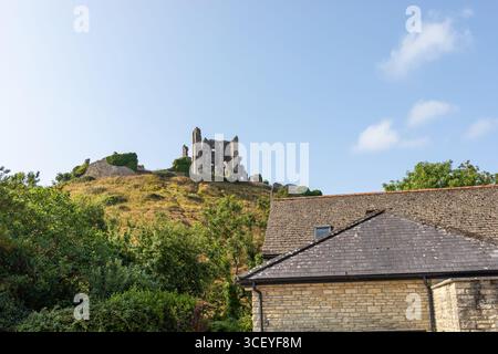 View of Corfe Castle on a summer morning. Dorset, England Uk Stock Photo