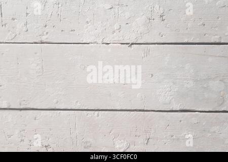 Old white painted exfoliate rustic bright light wooden texture. Wood background shabby Stock Photo