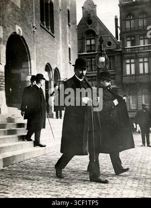 In 1909, a photo captures two coffee traders outside the Amsterdam Stock Exchange (Beurs van Berlage). On the left, A. van Dijk, secretary of the Coffee Trade Association, and on the right, Henri L. Bos, a coffee broker. Stock Photo