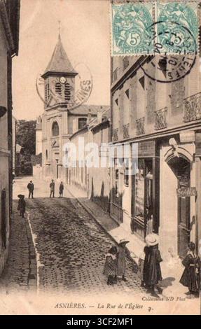 A street scene photograph showing commercial shops and pedestrian ...