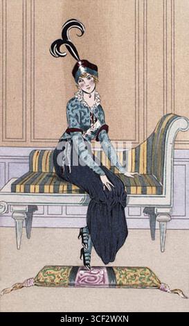 Fashion illustration of a navy muslin silk skirt with a crepe de Chine headwrap, turquoise brocading, and ruby embroidery, published in Journal des Dames et des Modes, Paris, on 1 May 1913. Stock Photo