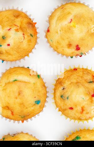 Confetti Vanilla Cupcakes on a White Background Stock Photo