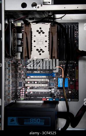 New motherboard installed in computer case Stock Photo