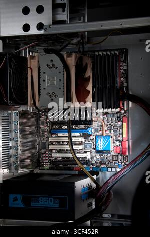 New motherboard installed in computer case Stock Photo