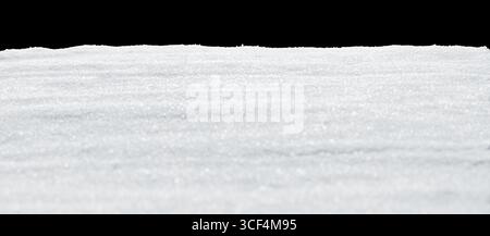 Real smooth white snow sparkling in winter sunlight. Flat snow drift with transparent background. Stock Photo