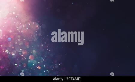 Sparkling glitter dust creating a vibrant pink, purple, and blue bokeh of lights. Dreamy or magical shimmering particles softly glowing. Galaxy or neb Stock Photo