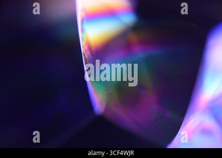 Rainbow flat film of liquid in macro, bright liquid surface, interference pattern, Bubbles in macro, connection of bubbles in macro Stock Photo