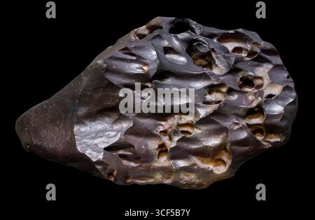 Ventifact, wind-blown, sand-sculpted, polished, and eroded stone. Stock Photo