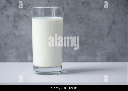 Close-up of glass with milk on table Stock Photo