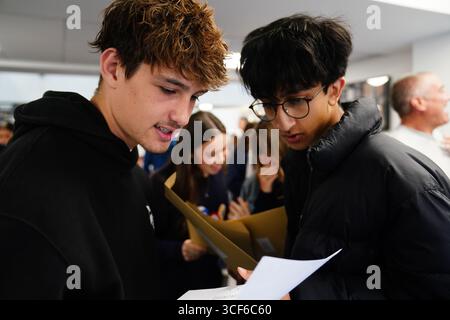 Pupils at Solihull School in Solihull receiving their GCSE results. Hundreds of thousands of pupils in England, Wales and Northern Ireland are receiving grades to help them progress to sixth form, college or training. Picture date: Thursday August 21, 2025. Stock Photo