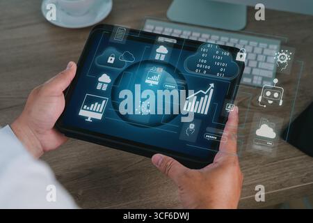User flowchart and business analytics with cloud computing and AI integration shown on a tablet, representing mobile digital solutions for data visual Stock Photo
