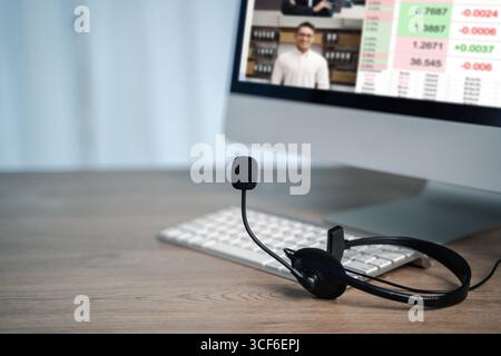 Desk setup for remote work showing a laptop, coffee, opened planner ...