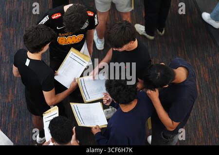 Pupils at Solihull School in Solihull receiving their GCSE results. Hundreds of thousands of pupils in England, Wales and Northern Ireland are receiving grades to help them progress to sixth form, college or training. Picture date: Thursday August 21, 2025. Stock Photo