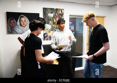 Pupils at Solihull School in Solihull receiving their GCSE results. Hundreds of thousands of pupils in England, Wales and Northern Ireland are receiving grades to help them progress to sixth form, college or training. Picture date: Thursday August 21, 2025. Stock Photo