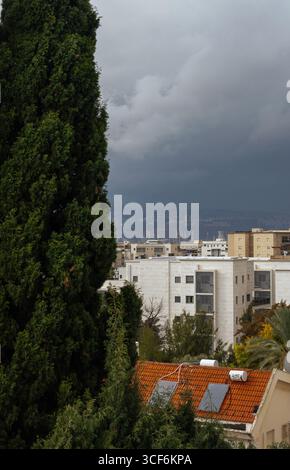 Residential buildings with rooftop solar panels are seen on the ...