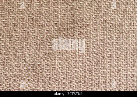 Woven burlap texture, with brown background. Stock Photo