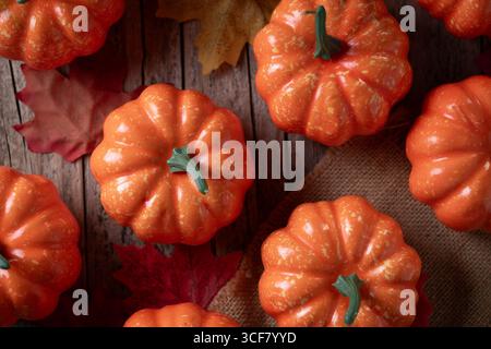 Autumn pumpkins background on rustic wooden table Stock Photo