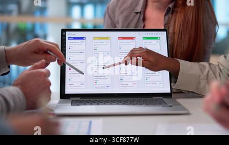 Agile Software Being Used By Diverse Team In Modern Office. Stock Photo