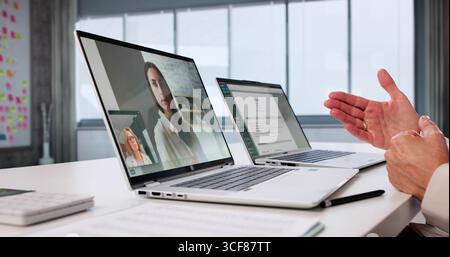Online Job Interview Through Video Conference With Virtual Meeting Presenter. Stock Photo