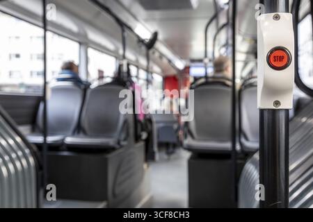 Button for the stop request on a public bus - Duesseldorf, North Rhine-Westphalia, Germany Stock Photo