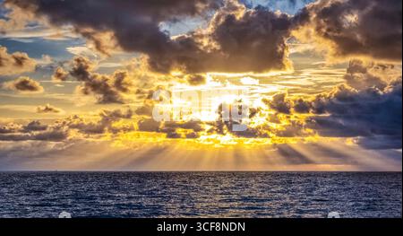 Sunset over the Gulf of America formerly the Gulf of Mexico from Venice Beach in Venice FLorida USA Stock Photo