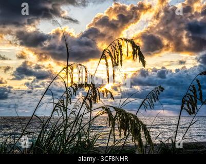 Sunset over the Gulf of America formerly the Gulf of Mexico from Venice Beach in Venice FLorida USA Stock Photo