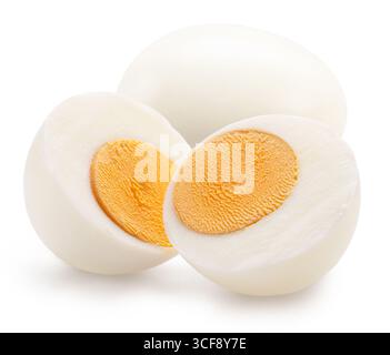 Hard-boiled chicken egg and egg cut in half  with yellow hard yolk on white background. File contains clipping path. Stock Photo