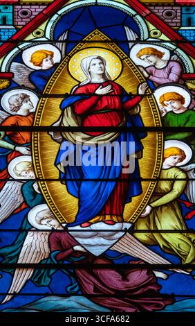 Church of Our Lady of the Assumption. Stained-glass window depicting ...