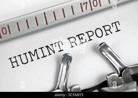 Human intelligence (acronym HUMINT) report text, large horizontal macro closeup, typewriter typed gathered data analysis reporting document concept Stock Photo