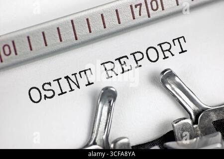 Open-source intelligence (acronym OSINT) report text macro closeup, typewriter typed open source intel data analysis reporting document concept Stock Photo