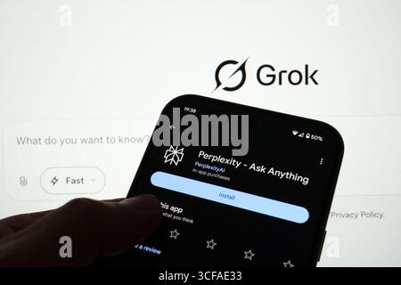 Perplexity AI app listing on Google Play displayed on smartphone with install button and rating over branded backdrop. Stafford, United Kingdom, Augus Stock Photo