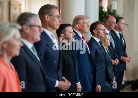 President Donald Trump poses for a family photo with President Volodymyr Zelenskyy of Ukraine and European leaders before their multilateral meeting, Monday, August 18, 2025, in the Cross Hall on the State Floor of the White House. (Official White House Photo by Andrea Hanks) Stock Photo