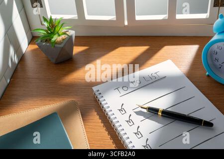 A notebook with "TO DO LIST" written on it. Productivity, time management, daily tasks concept. Stock Photo