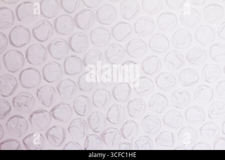 White plastic bubble wrap texture, close-up view. Stock Photo