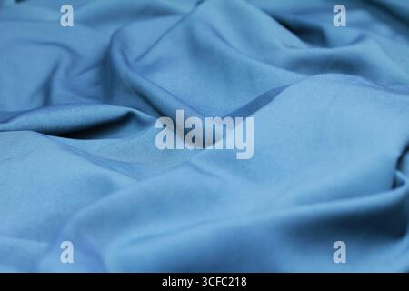 Close up of a fabric background with a wavy pattern. Stock Photo