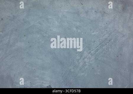Detailed macro background of worn gray painted metal with scuffs and various dirt. Stock Photo