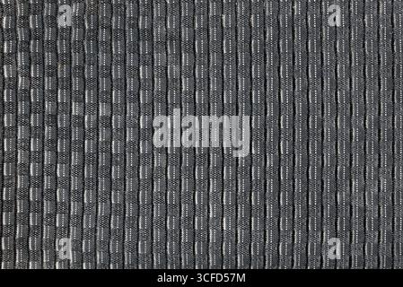Textured background of gray carpet speckled with vertical lines in gray blocks. Top view. Stock Photo