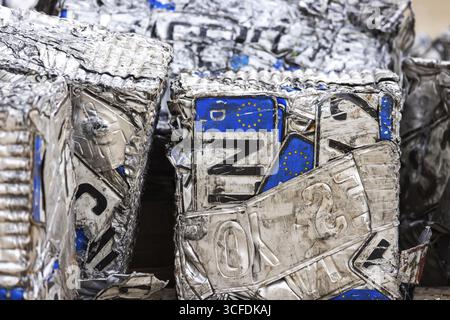 Cubes made from scrap metal, disused car licence plates. Symbolic photo. Stuttgart, Baden-Wuerttemberg, Germany Stock Photo