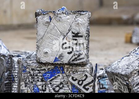 Cubes made from scrap metal, disused car licence plates. Symbolic photo. Stuttgart, Baden-Wuerttemberg, Germany Stock Photo