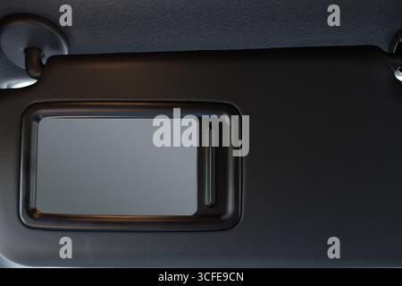 Car sun visor mirror close-up Stock Photo